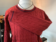 Cable knit sweater in soft red with blue accents