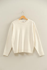 Crew Neck Sweater in Whip Cream color.