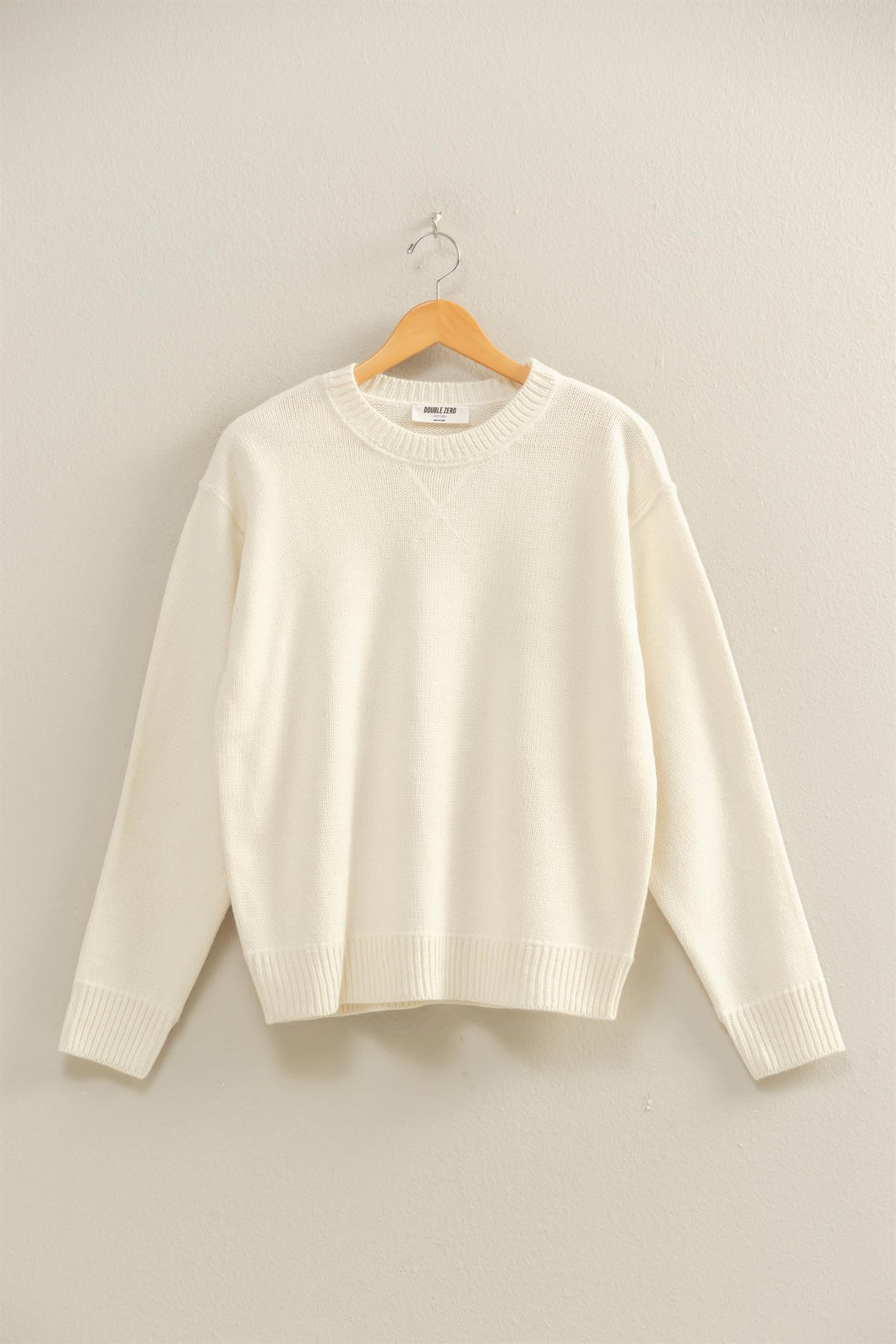 Crew Neck Sweater in Whip Cream color.